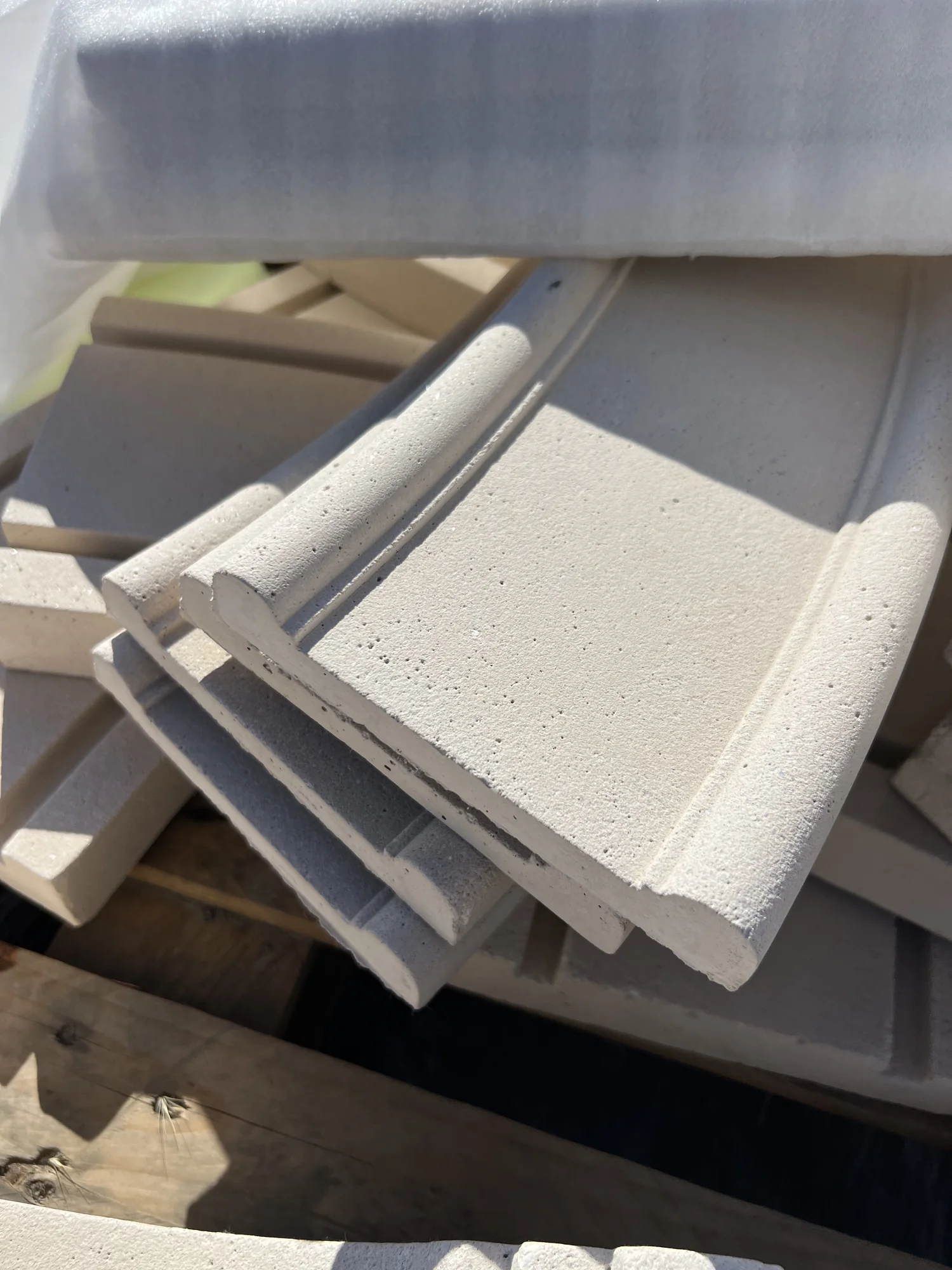 Physical moulding samples showing shaped profiles and surface texture